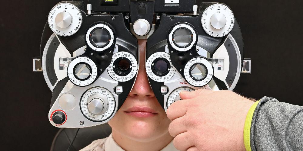 Patient in front of a vision tester